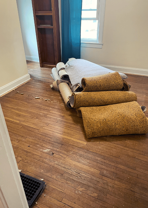 Removing carpet from floors