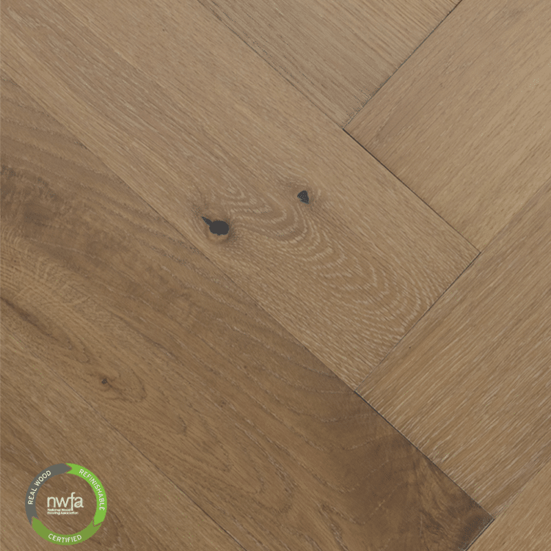 The Castillian Premier Herringbone collection, White Oak Natural floor, finely selected from Vietnam, is an artistically crafted example of engineered hardwood flooring.