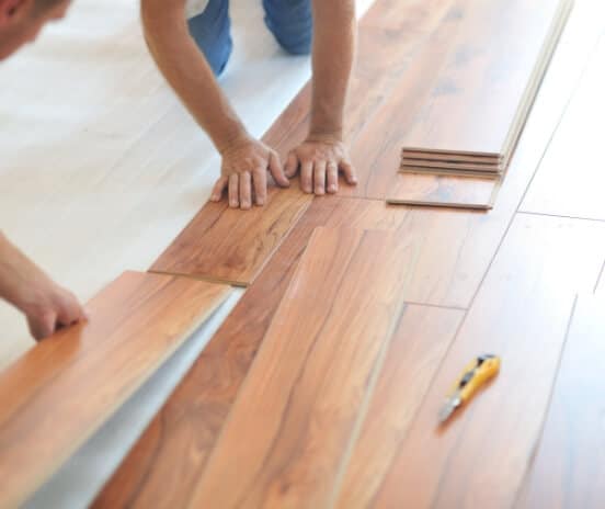Installing high-quality flooring panels.