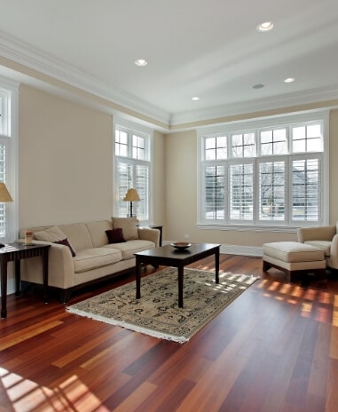 A living room featuring wood flooring.
