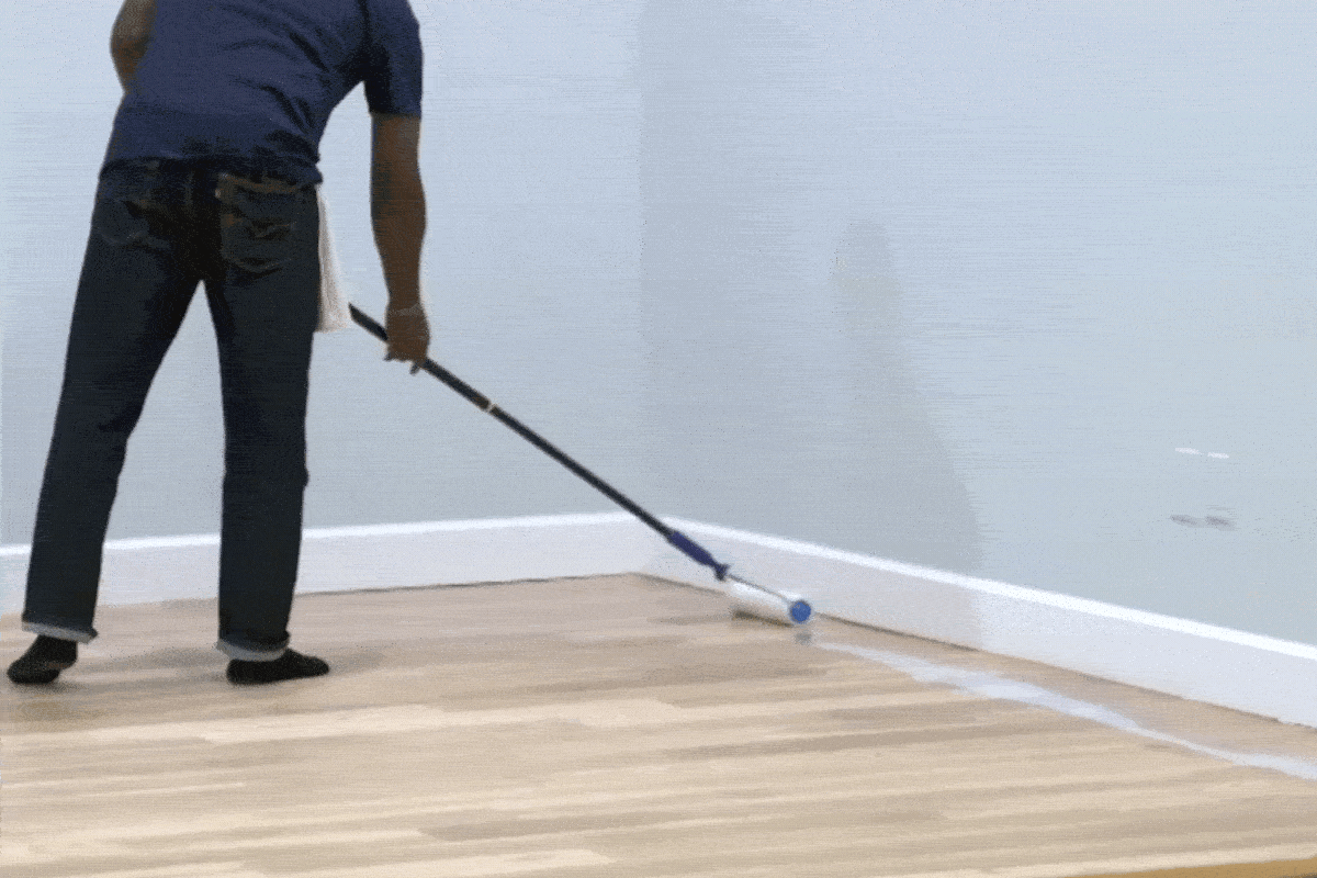 feathering sealer near the walls using a microfiber roller