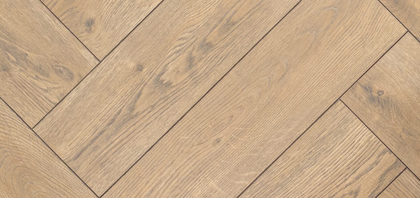 close up image of herringbone wood floors