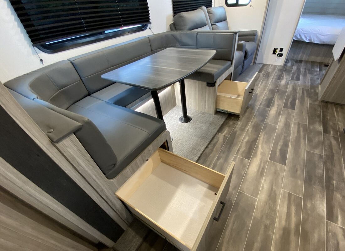 stylish modern camper interior with gray luxury vinyl flooring
