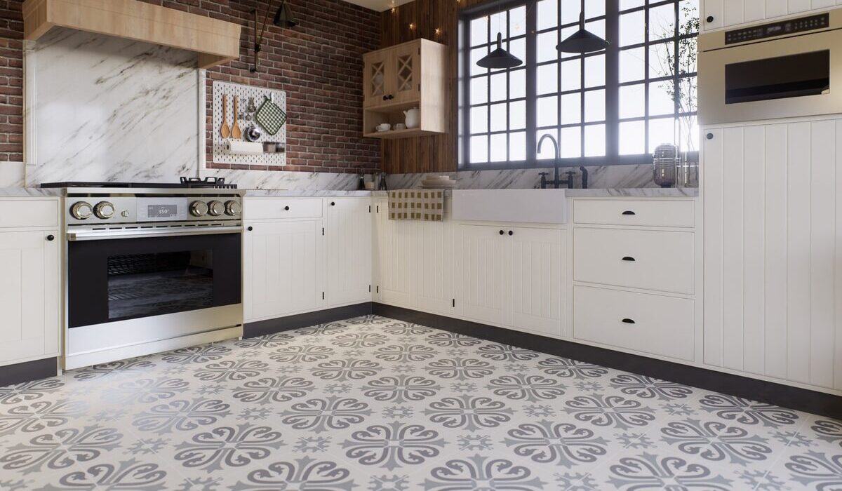 a retro style kitchen with white cabinets and abstract tile floors
