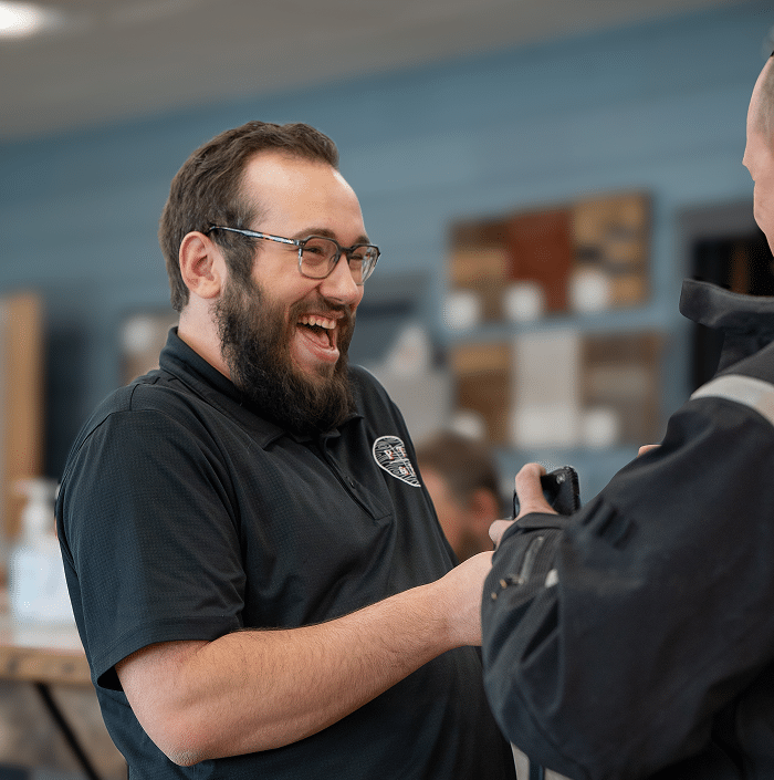 flooring specialist dane rindler helps a customer
