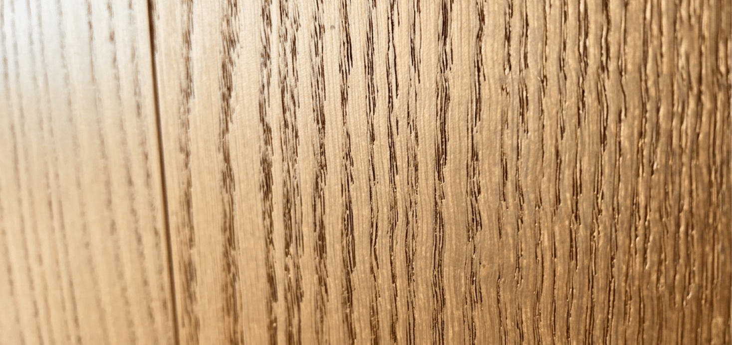 wire-brushed hardwood flooring close up from our showroom